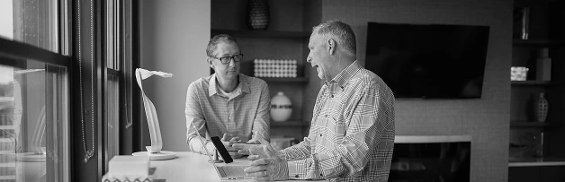two businessmen discussing